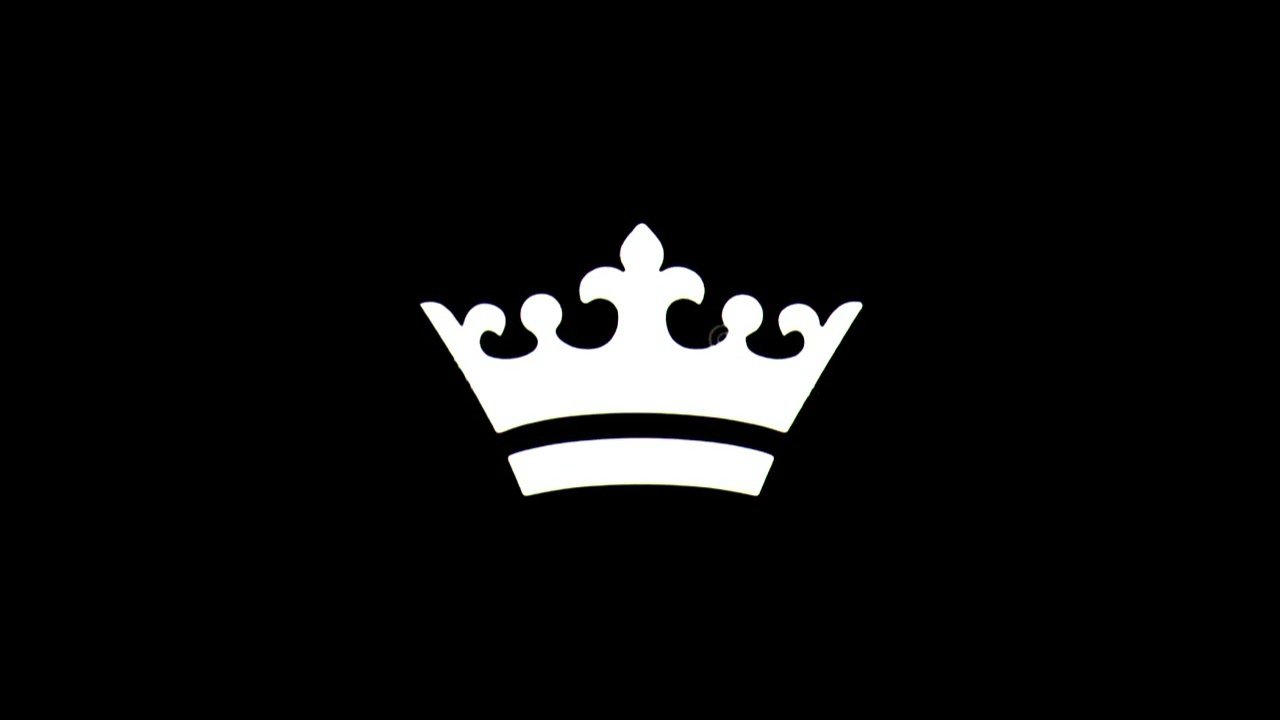 Силуэт короны на черном фоне