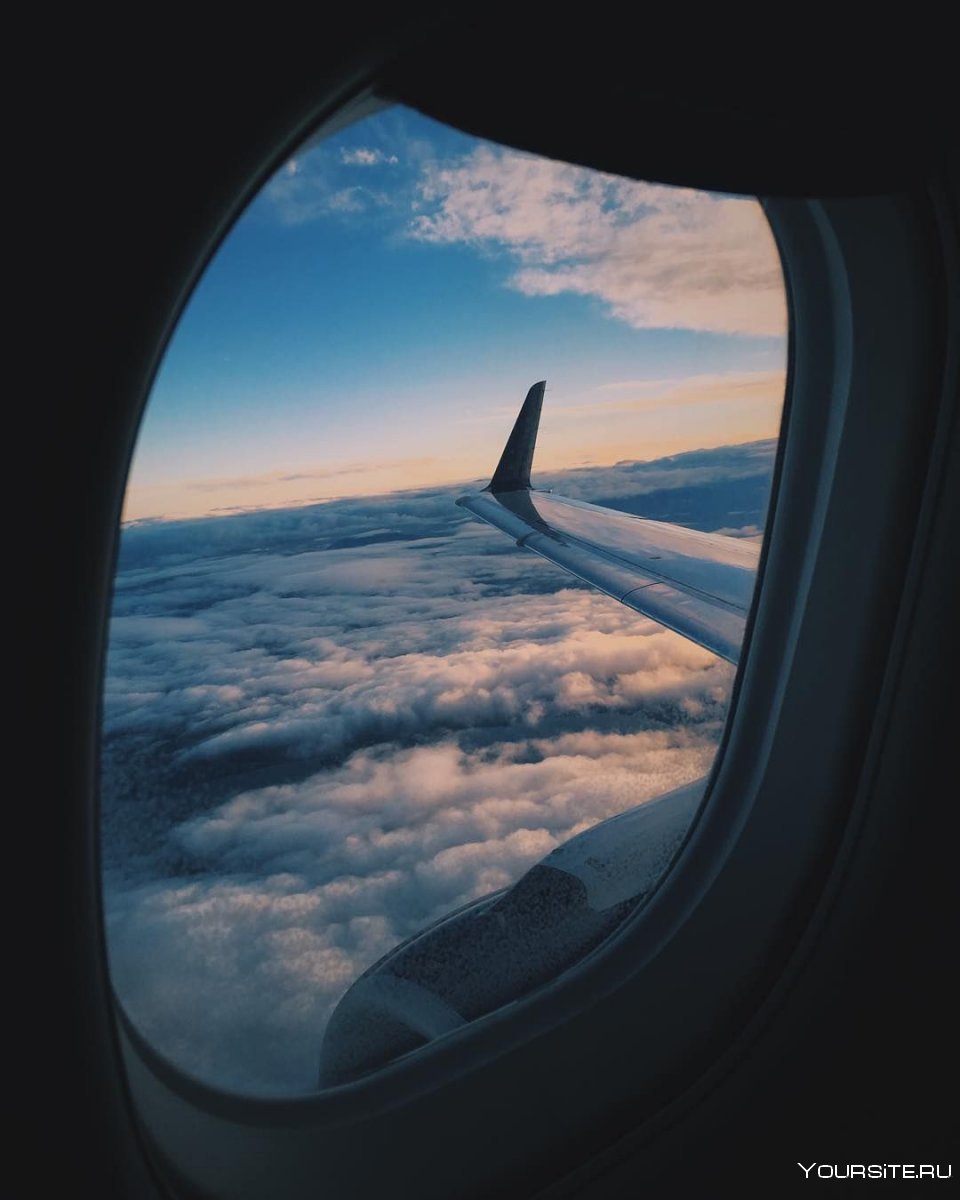 Салон самолета иллюминатор