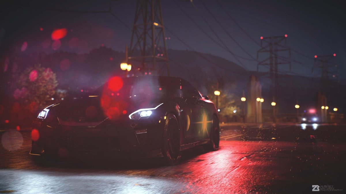 Парень возле машины ночью