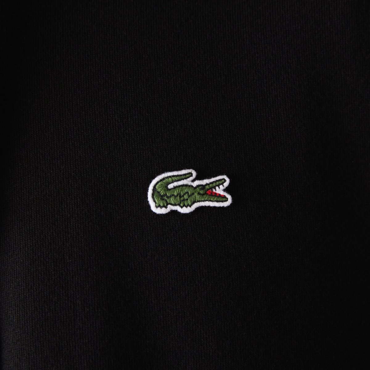 Lacoste знак