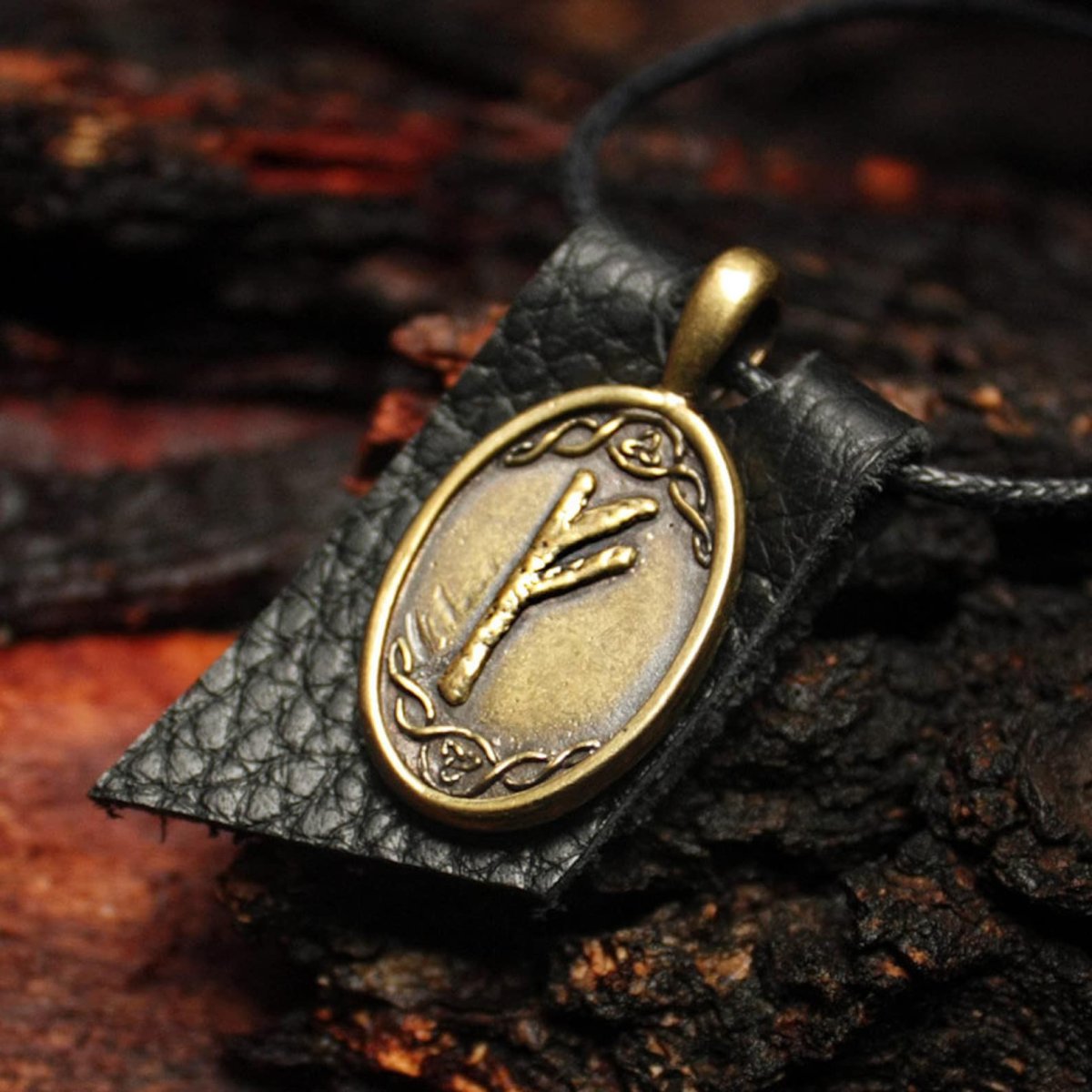 Амулет с руной Феху