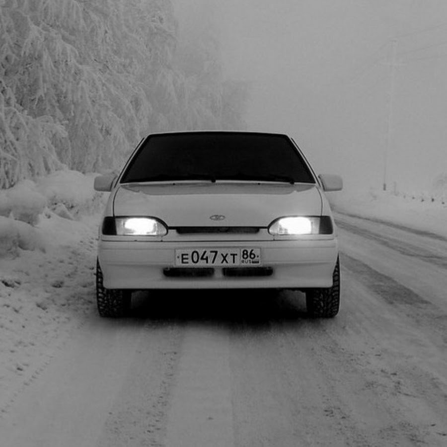 Белая 2114 зимой опер