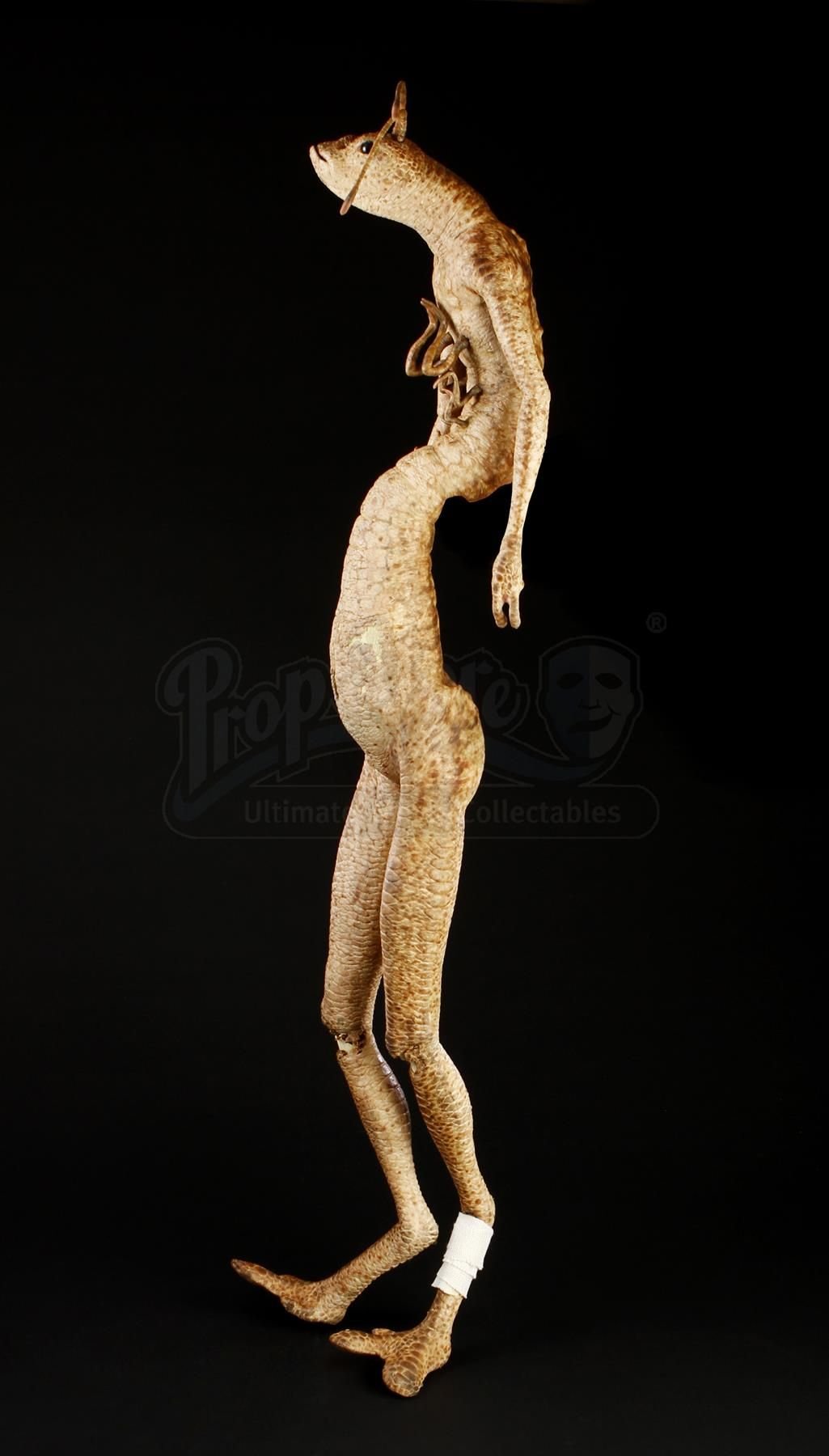 Осьминожка из люди в черном