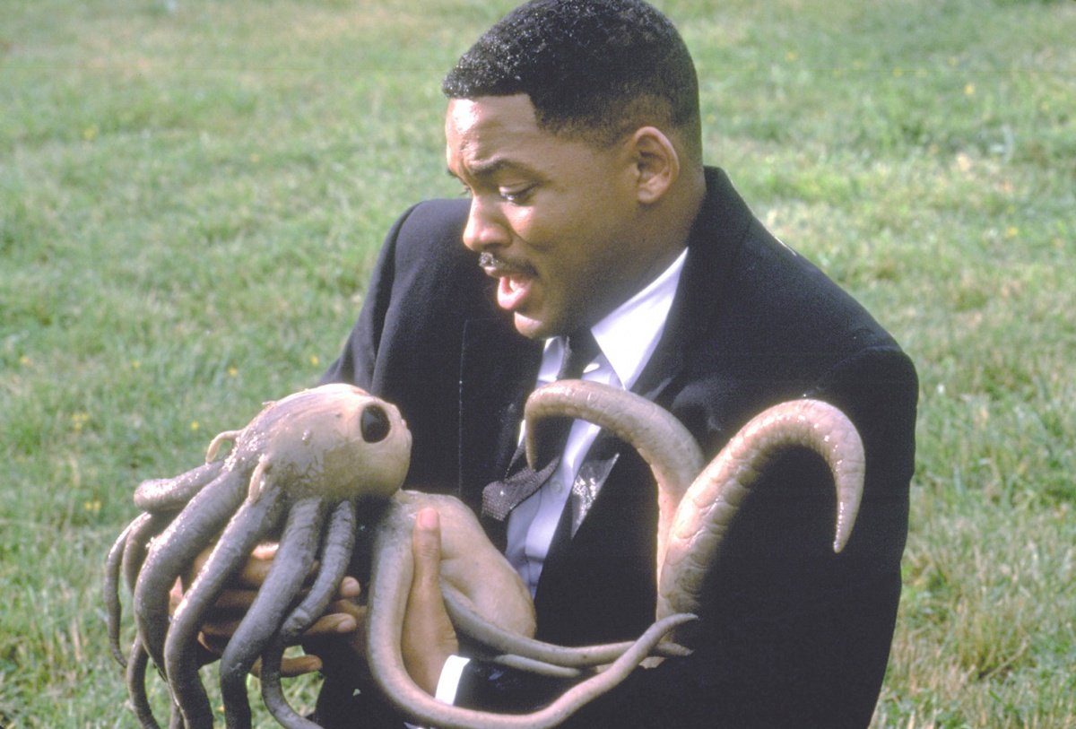 Гуманоиды из людей в черном