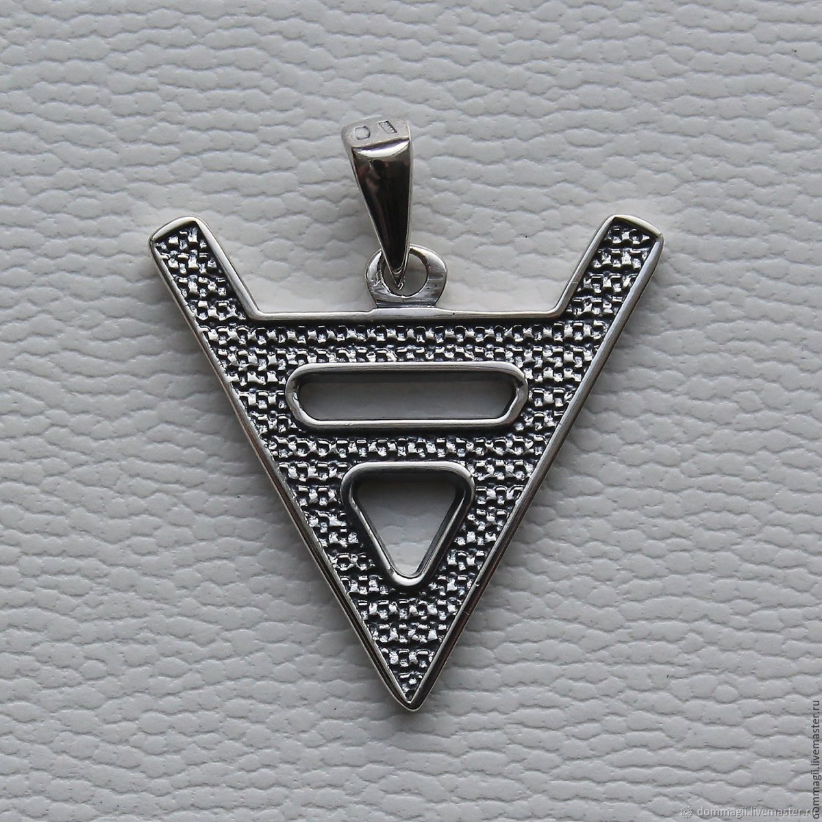 Символ Бога Велеса бычья голова