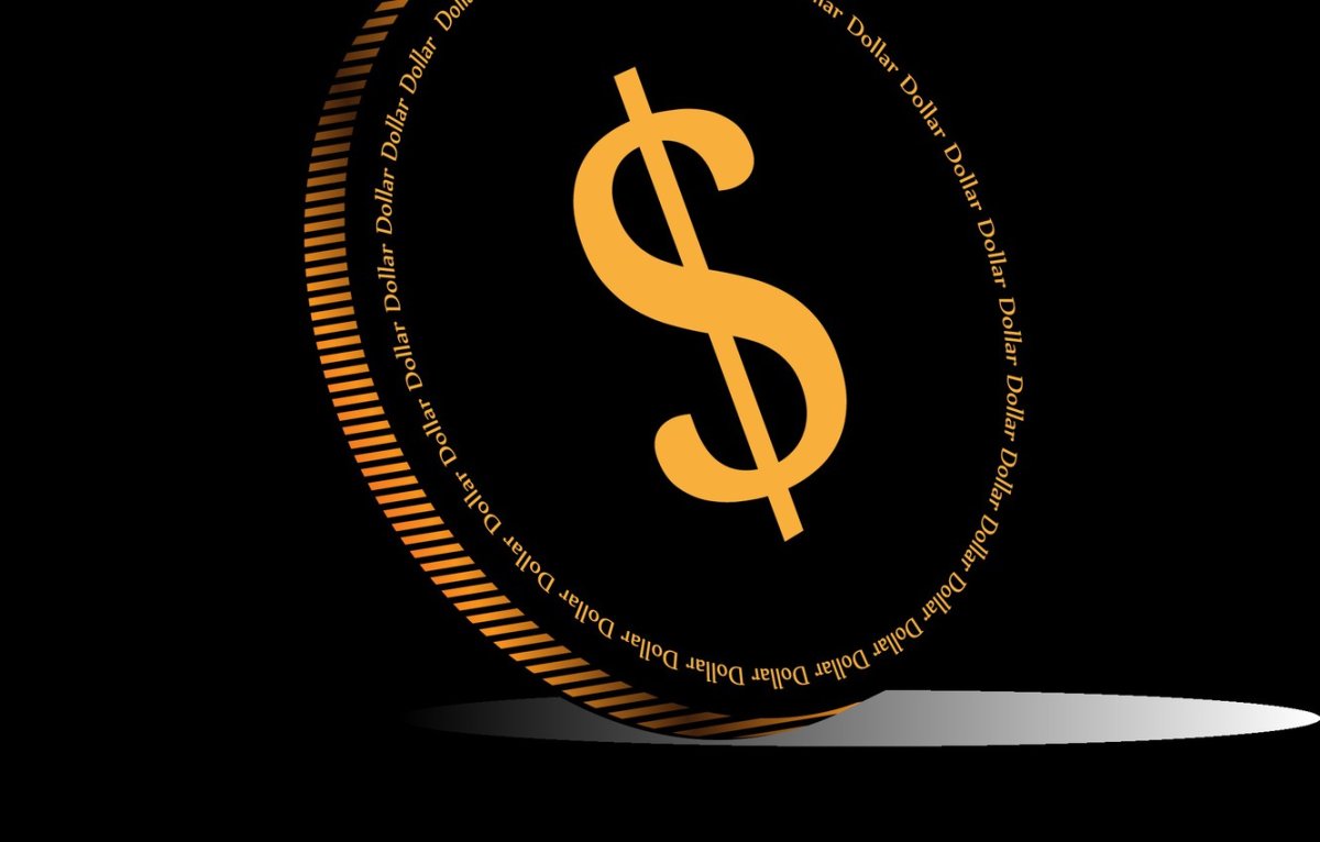 Знак доллара на темном фоне