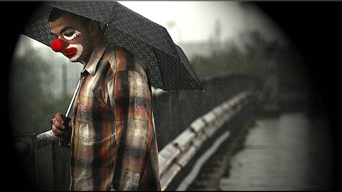 Клоун под дождем