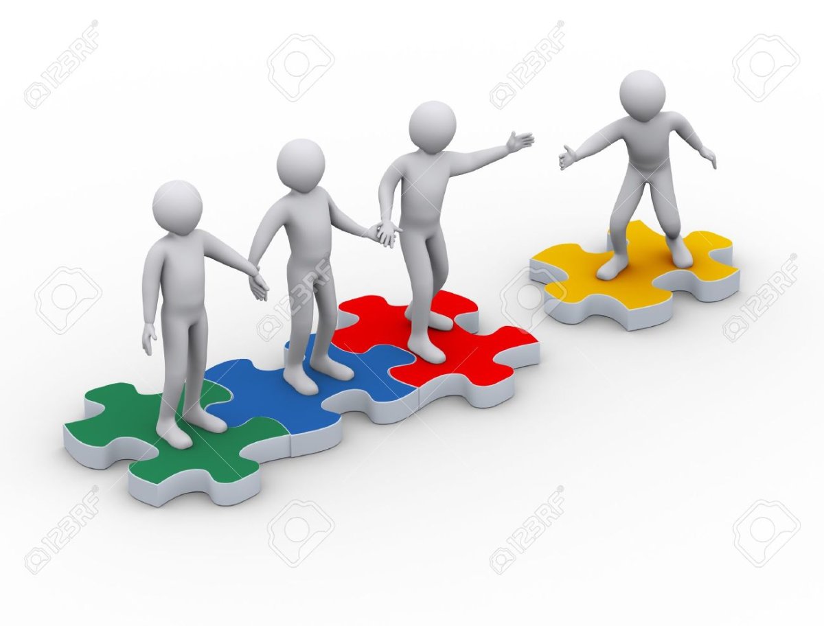 Люди, стоящие на пазлы