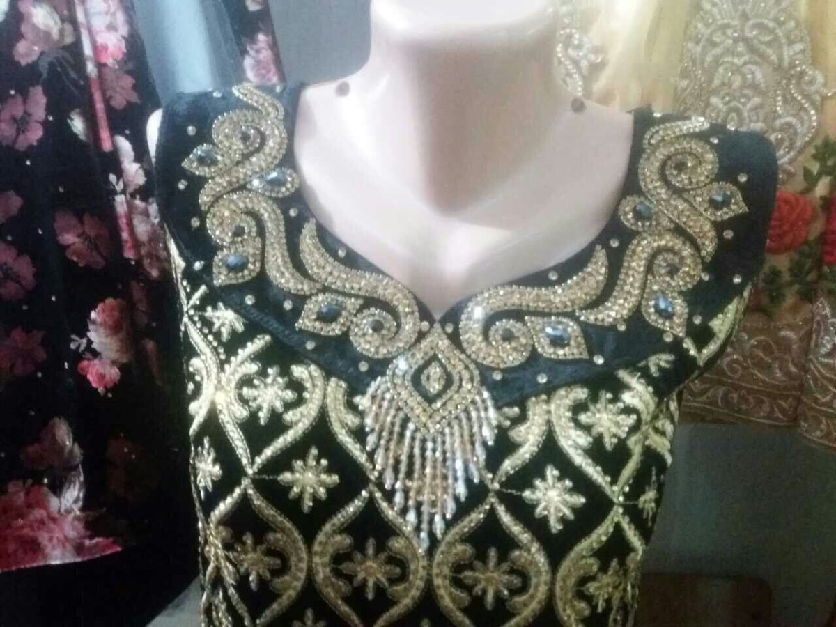 Украшения платья таджикский