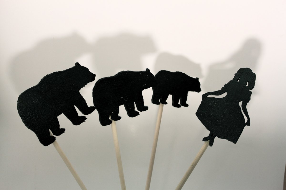 Фигурки животных тенями